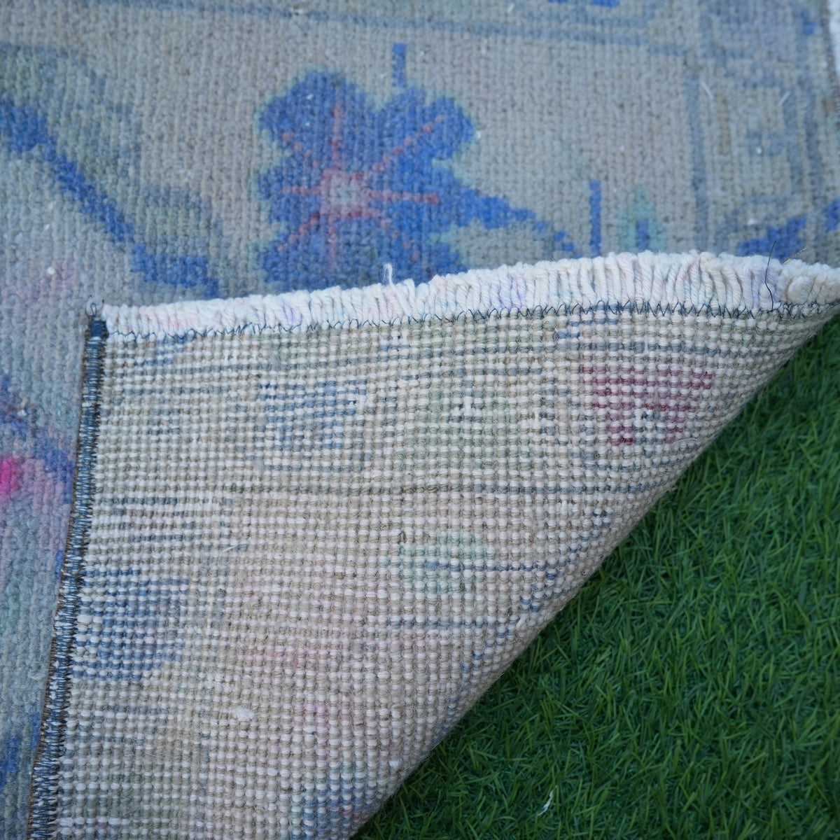1970s beige vintage turkish rug with traditional design, hand-knotted weave and low pile.
