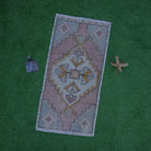 Pink 1' x 3' vintage turkish rug with traditional design, handmade in Turkey – Ara.