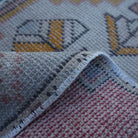 Additional view of the pink vintage turkish rug, hand-knotted in wool and cotton.