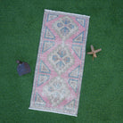 Pink 1' x 3' vintage turkish rug with traditional design, handmade in Turkey – Marco.