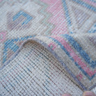 Additional view of the pink vintage turkish rug, hand-knotted in wool and cotton.