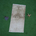 Beige 2' x 3' vintage turkish rug with neutral design, handmade in Turkey – Mia.