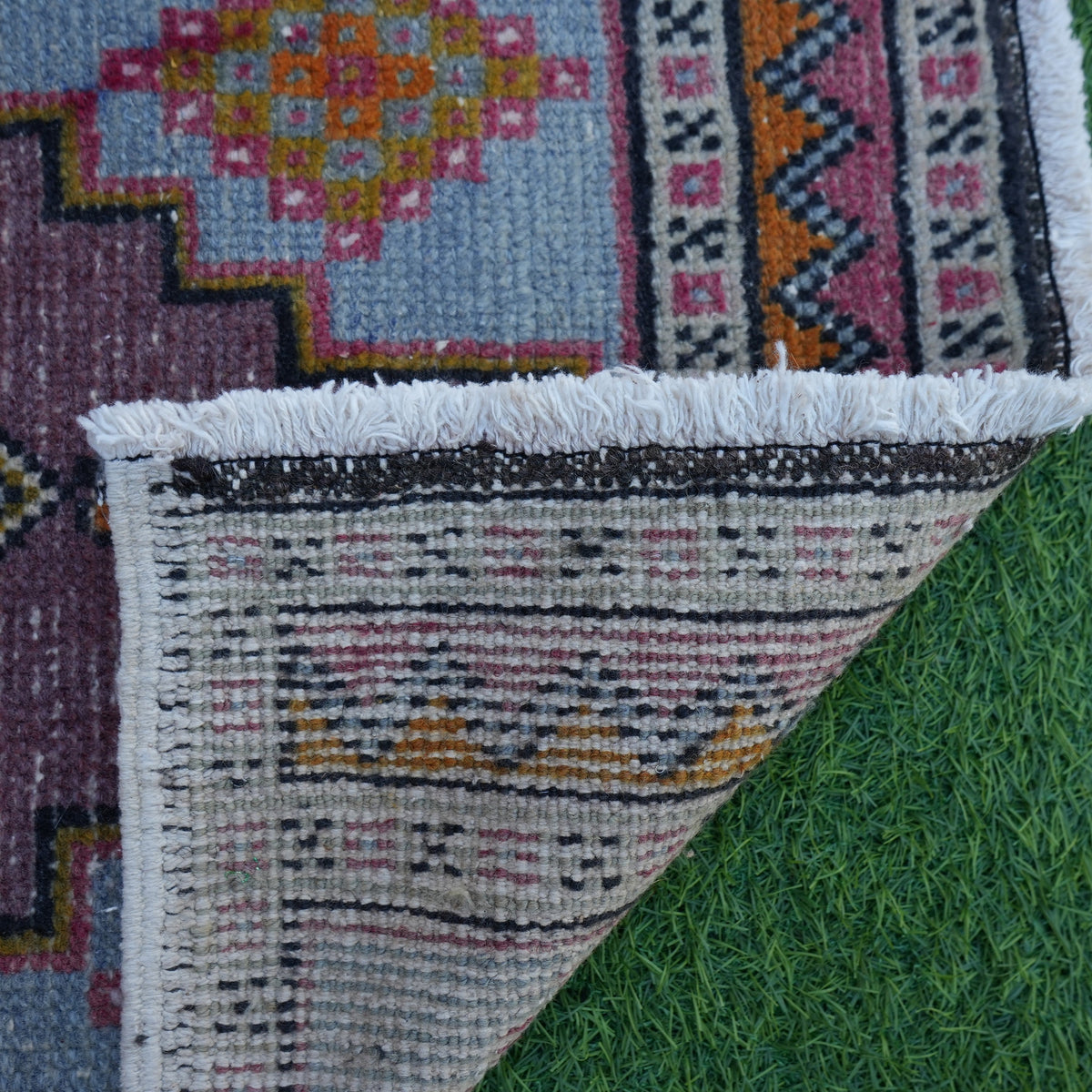 1970s blue vintage turkish rug with traditional design, hand-knotted weave and low pile.