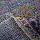 1970s pale red vintage turkish rug with traditional design, hand-knotted weave and low pile.