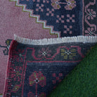 1970s pink vintage turkish rug with traditional design, hand-knotted weave and low pile.