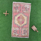 Pink 2' x 3' vintage turkish rug with geometric design, handmade in Turkey – Leach.