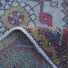 Additional view of the red vintage turkish rug, hand-knotted in wool and cotton.