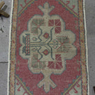 1970s red vintage turkish rug with traditional design, hand-knotted weave and low pile.
