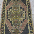 1970s pink vintage turkish rug with traditional design, hand-knotted weave and low pile.