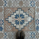 1970s blue vintage turkish rug with traditional design, hand-knotted weave and low pile.