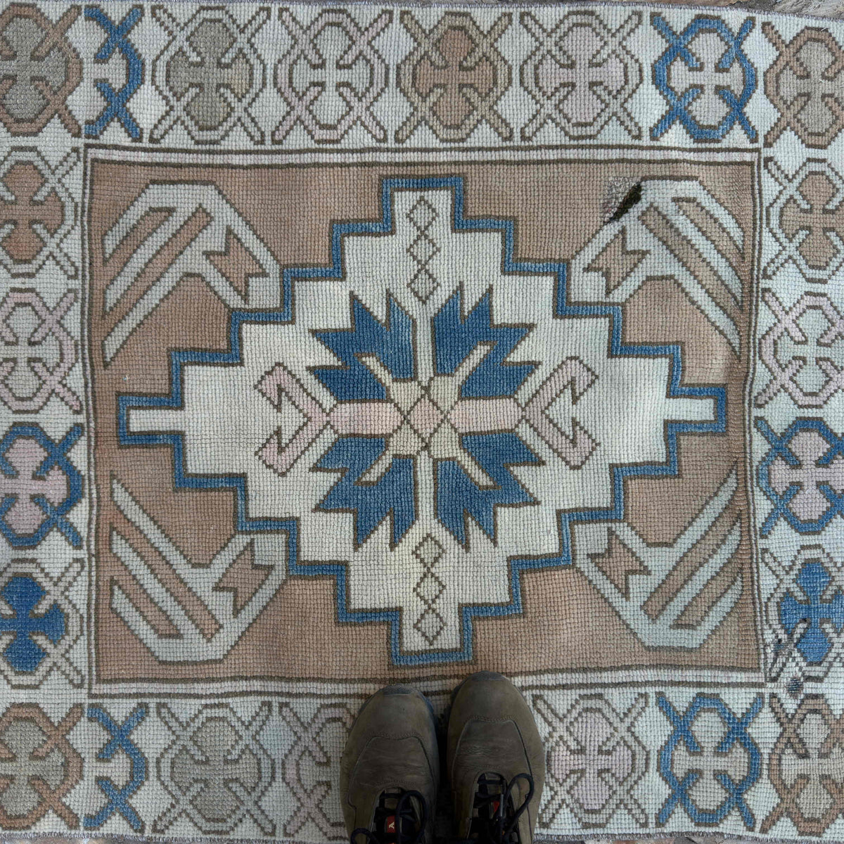 1970s blue vintage turkish rug with traditional design, hand-knotted weave and low pile.