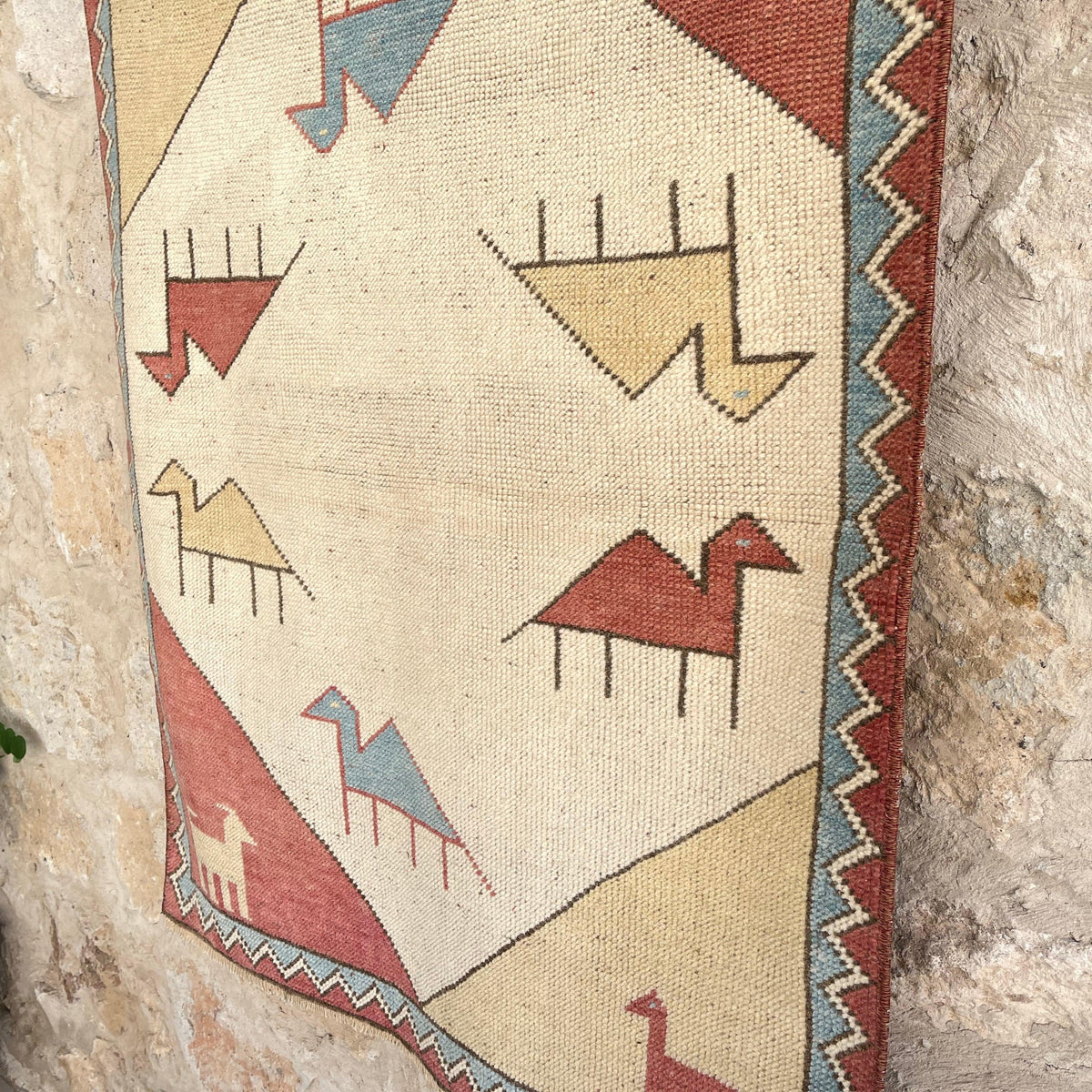 1970s red vintage turkish rug with traditional design, hand-knotted weave and low pile.