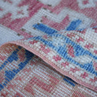 Additional view of the blue vintage turkish rug, hand-knotted in wool.