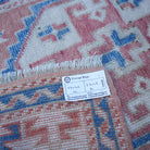 Blue 3' x 5' vintage turkish rug from the 1970s with traditional design.