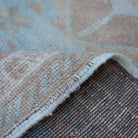 Additional view of the blue vintage turkish rug, hand-knotted in wool.