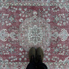 1970s red vintage turkish rug with traditional design, hand-knotted weave and low pile.