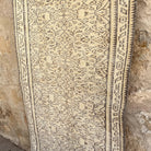 1970s beige vintage turkish rug with neutral design, hand-knotted weave and low pile.