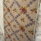 1970s brown vintage turkish rug with traditional design, hand-knotted weave and low pile.