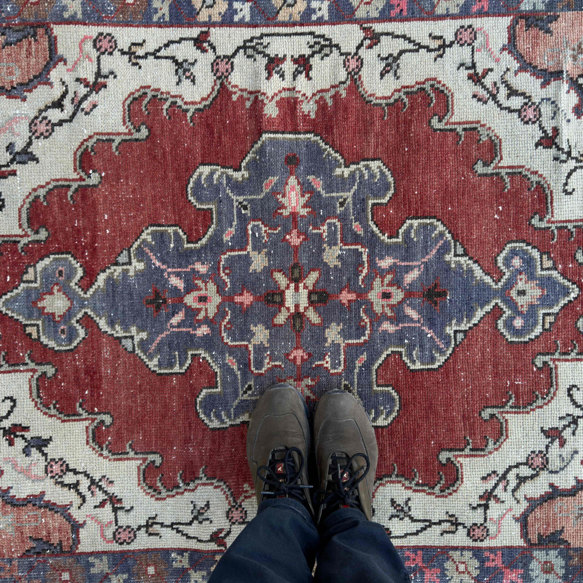 1970s multicolor vintage turkish rug with geometric design, hand-knotted weave and low pile.