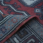 Additional view of the red vintage turkish rug, hand-knotted in wool.