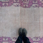 1970s beige vintage turkish rug with traditional design, hand-knotted weave and low pile.