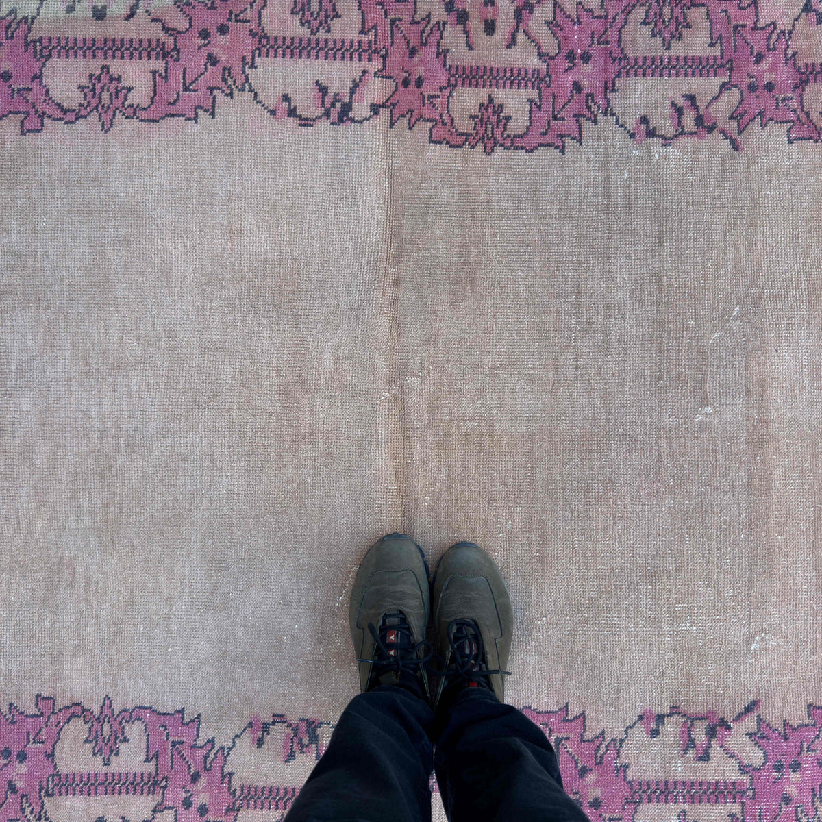 1970s beige vintage turkish rug with traditional design, hand-knotted weave and low pile.