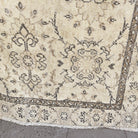 Close-up of the brown vintage turkish rug showing neutral details, hand-knotted weave, wool and cotton and low pile.