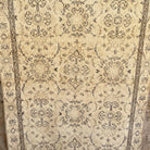 Brown 4' x 6' vintage turkish rug in wool and cotton, shown on the floor.