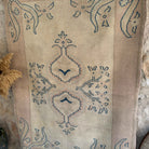 Pink 4' x 6' vintage turkish rug in wool and cotton, shown on the floor.