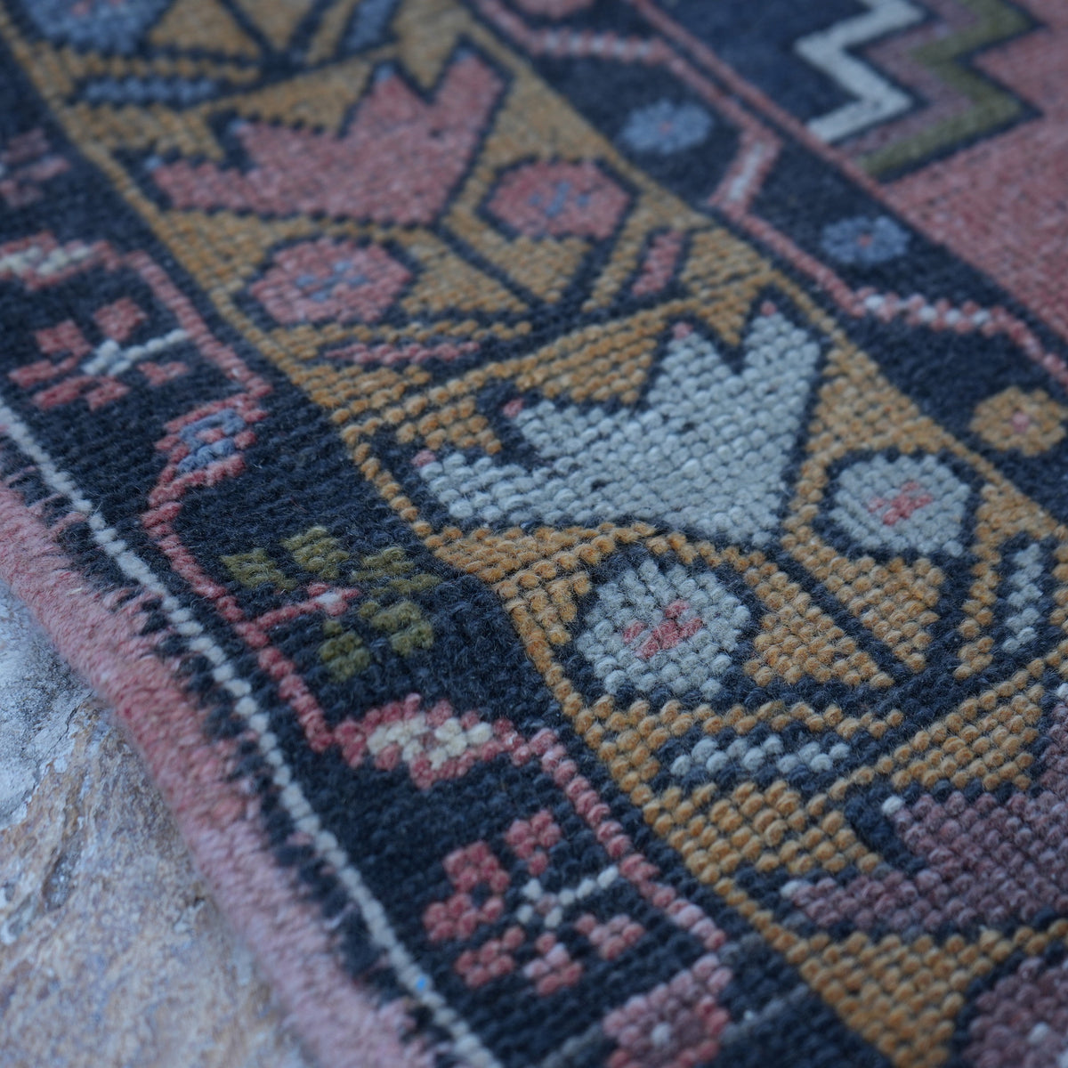 Red 4' x 6' vintage turkish rug in wool, shown on the floor.