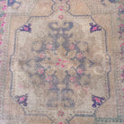 1970s beige vintage turkish rug with medallion design, hand-knotted weave and low pile.