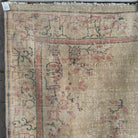 Beige 4' x 7' vintage turkish rug in wool and cotton, shown on the floor.