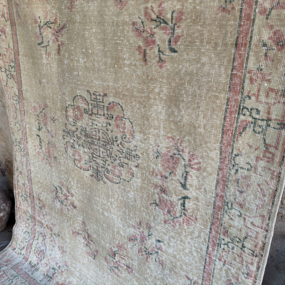 1970s beige vintage turkish rug with neutral design, hand-knotted weave and low pile.