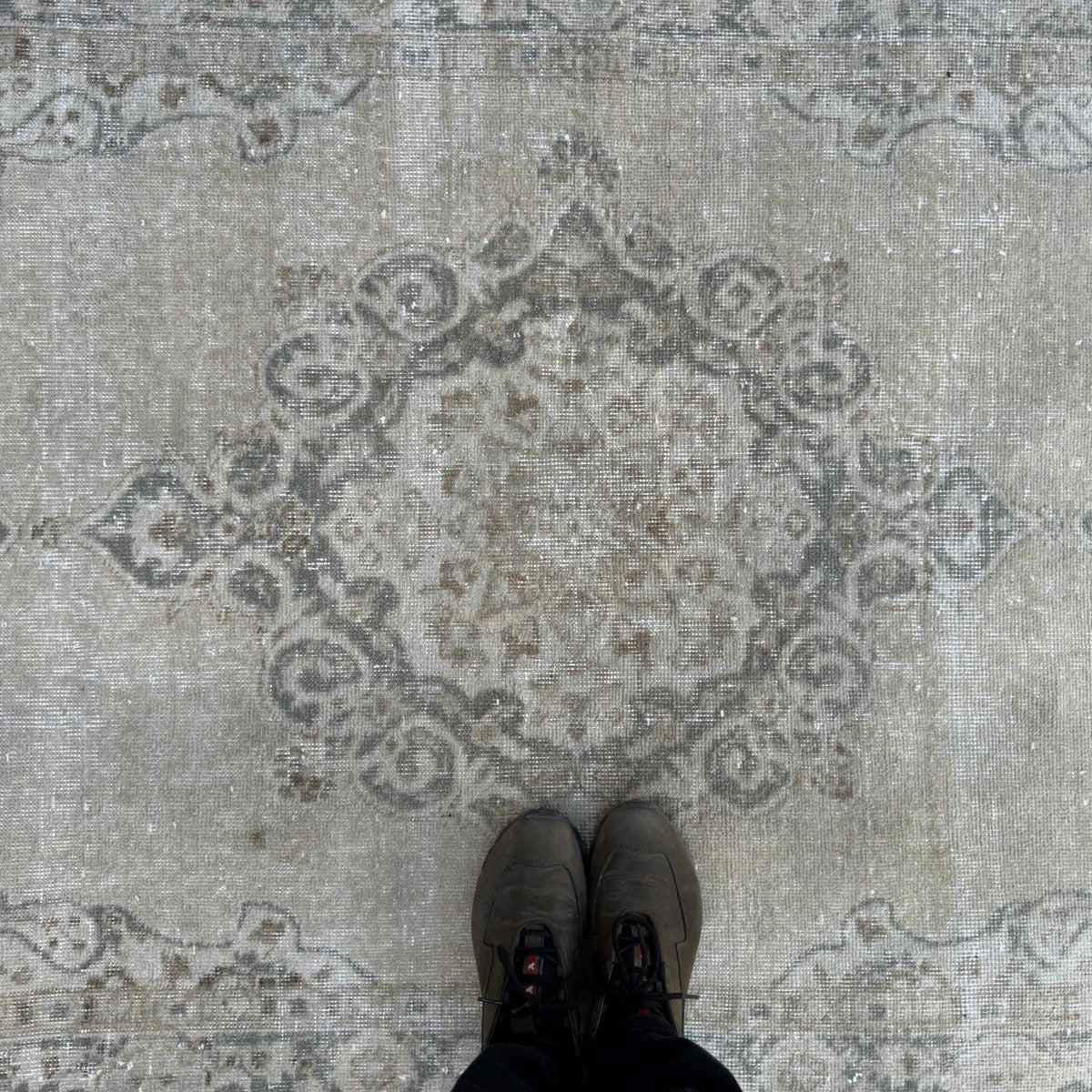 1970s beige vintage turkish rug with neutral design, hand-knotted weave and low pile.