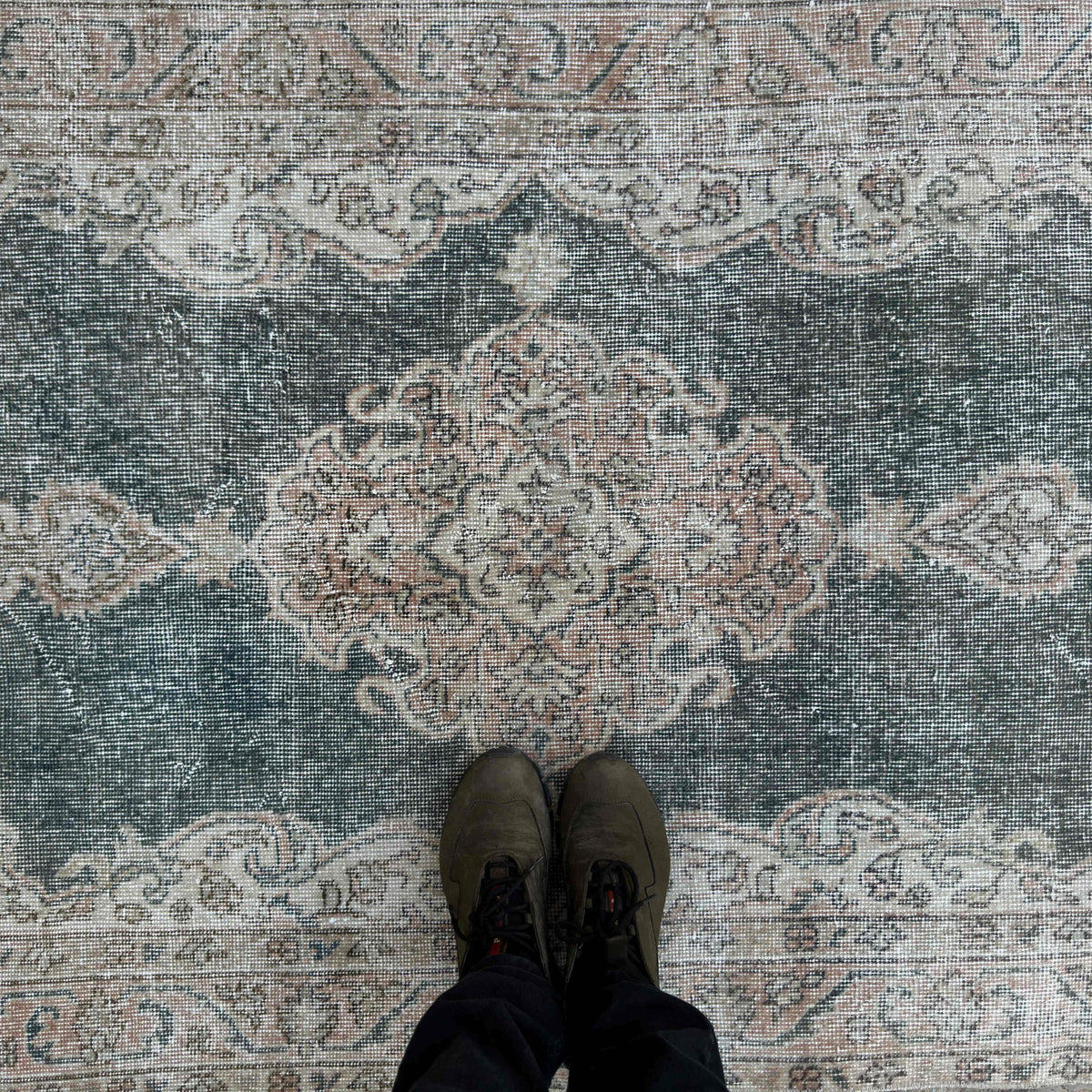 1970s blue vintage turkish rug with neutral design, hand-knotted weave and low pile.