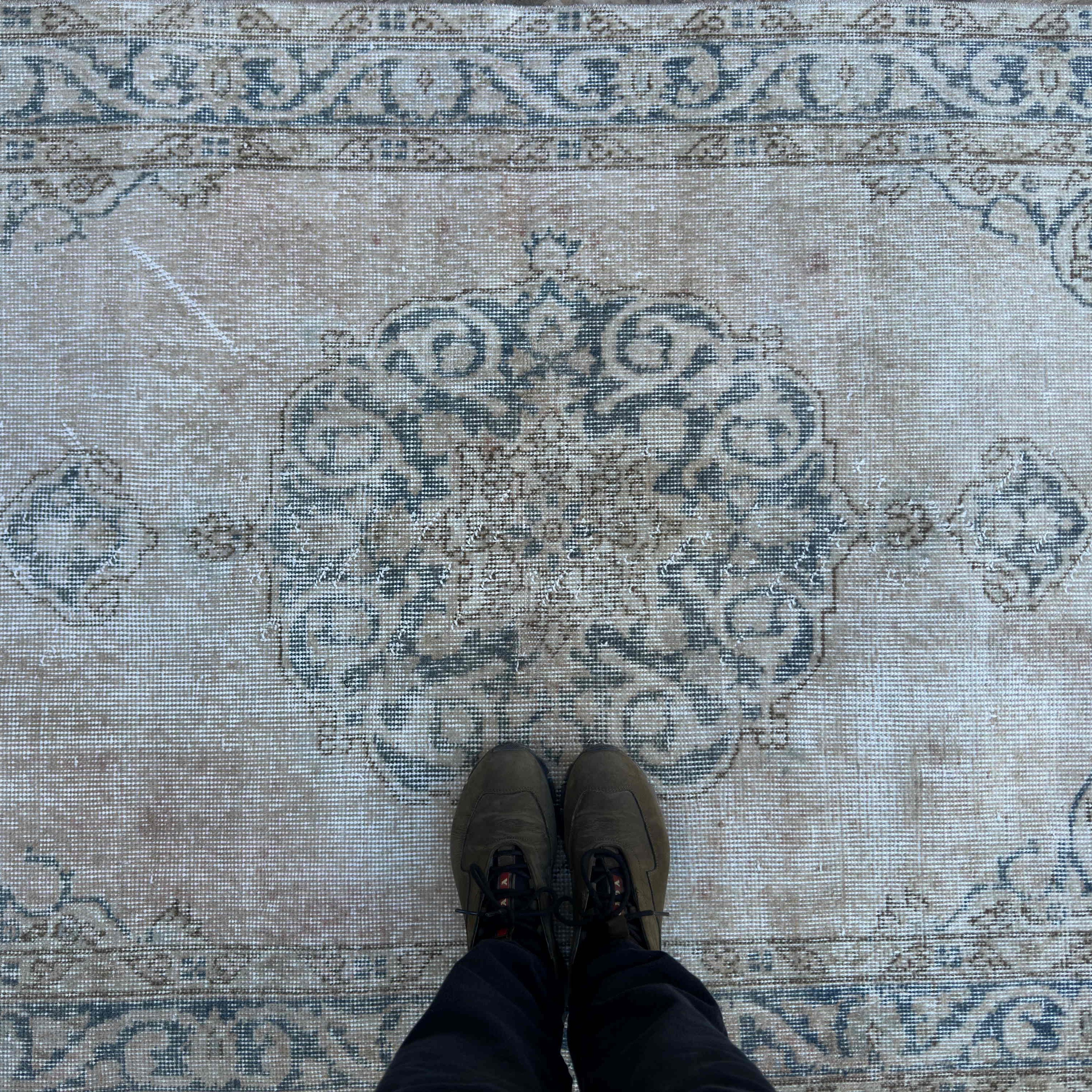 1970s blue vintage turkish rug with medallion design, hand-knotted weave and low pile.