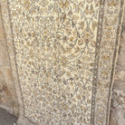 1970s brown vintage turkish rug with floral design, hand-knotted weave and low pile.