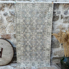Gray 4' x 7' vintage turkish rug with floral design, handmade in Turkey – Louie.