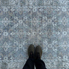 1970s gray vintage turkish rug with floral design, hand-knotted weave and low pile.