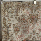1970s green vintage turkish rug with traditional design, hand-knotted weave and low pile.