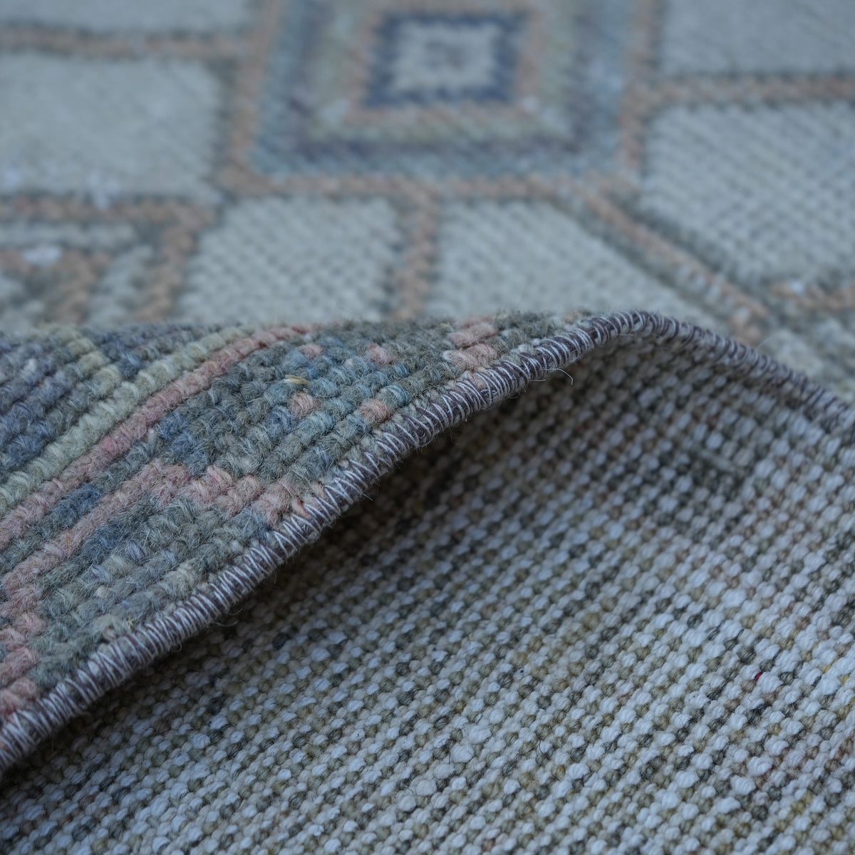Additional view of the orange vintage turkish rug, hand-knotted in wool.