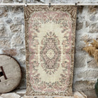 Pink 4' x 7' vintage turkish rug with medallion design, handmade in Turkey – Evans.