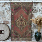 Pink 4' x 7' vintage turkish rug with traditional design, handmade in Turkey – Virle.