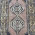 1970s yellow vintage turkish rug with geometric design, hand-knotted weave and low pile.