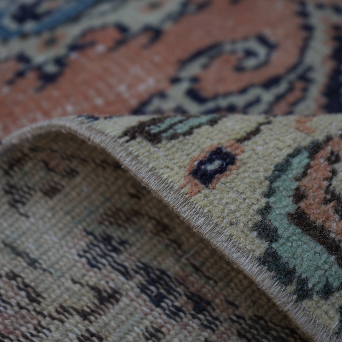 Additional view of the orange vintage turkish rug, hand-knotted in wool and cotton.