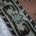 Orange 4' x 8' vintage turkish rug in wool and cotton, shown on the floor.
