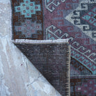 1970s brown vintage turkish rug with traditional design, hand-knotted weave and low pile.