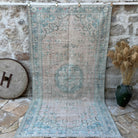 Pink 5' x 10' vintage turkish rug with medallion design, handmade in Turkey – Zayden.