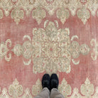 1970s red vintage turkish rug with traditional design, hand-knotted weave and low pile.