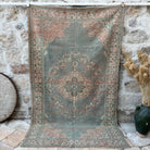 Blue 5' x 8' vintage turkish rug with medallion design, handmade in Turkey – Adelaiade.